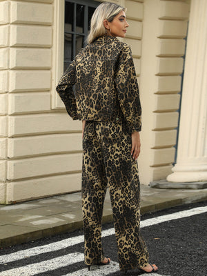 Leopard print denim jacket with button front and classic collar.