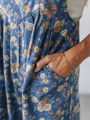 Floral denim overalls with adjustable straps and side pockets, women's casual style.