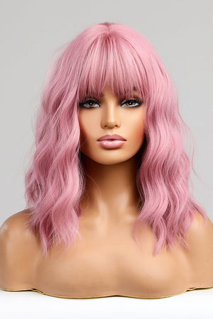 Pink bob wig with bangs and wavy texture