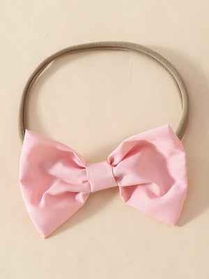 Pink bow headband for baby girl with soft elastic band