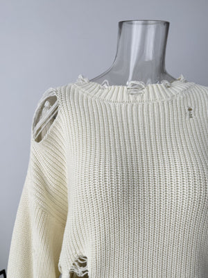 Off white distressed cotton sweater with ripped details and frayed neckline.