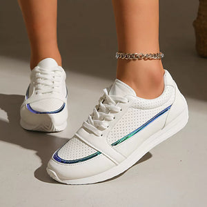 White lace-up sneakers with iridescent trim and perforated detail.