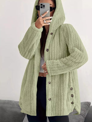 Green button-up fleece jacket with hood and textured fabric.