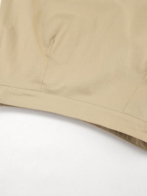 High-waisted A-line skirt in beige cotton with visible stitching detail.