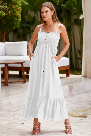 White smocked bodice maxi dress with button detail and ruffled hem