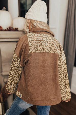 Camel corduroy jacket with leopard print panels on the back and sleeves.