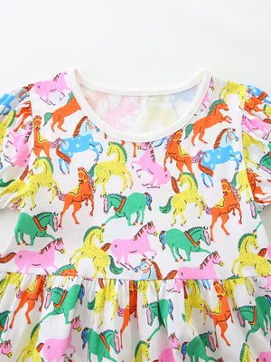Toddler cotton dress with playful multi-color horse print and puff sleeves.