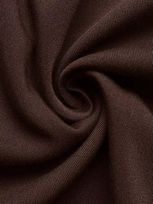 Brown A-line midi dress fabric detail, showing textured knit and soft drape.
