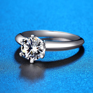 Sterling silver ring with a brilliant moissanite solitaire stone.