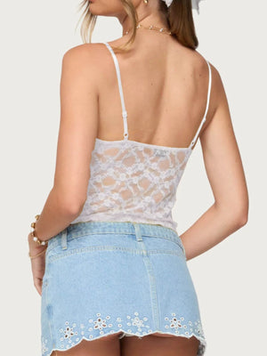 White sheer floral lace cami with adjustable straps and a cropped cut.