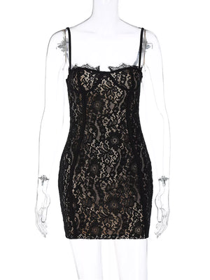 Black lace mini dress with spaghetti straps and scalloped lace trim.