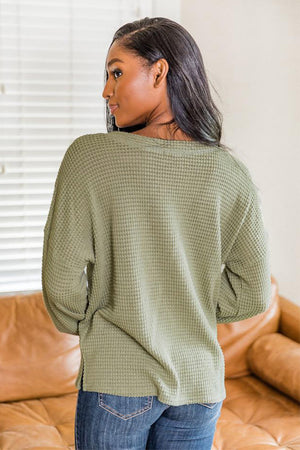 Waffle knit henley pullover in Matcha Green with long sleeves and a relaxed fit.