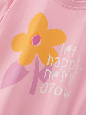 Pink cotton baby tee with yellow flower graphic and "happiness grow" text