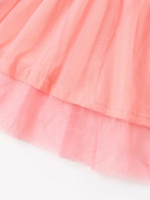 Toddler dress with layered pink tulle skirt and cotton top.