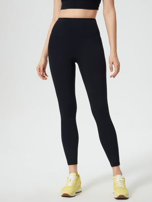Black high-waisted sculpted contour leggings with a seamless design and pocket detail.