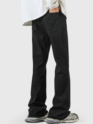 Men's black 100% cotton flare jeans with raw hem detail.