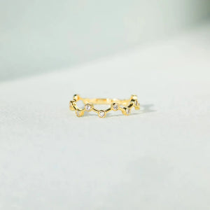 Gold celestial wave ring with clear zirconia stones