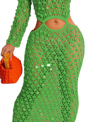 Green mesh cutout maxi gown with sequins, long sleeves, and bodycon fit.