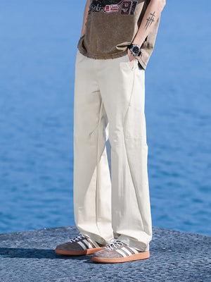 Relaxed fit men's lightweight joggers in apricot with a casual, loose cut.