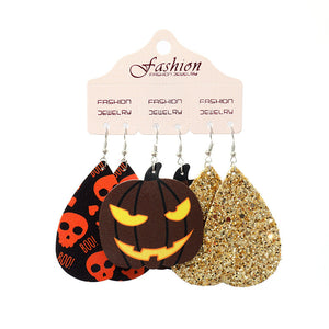 Halloween dangle earrings set with pumpkin, skull, and glitter designs.
