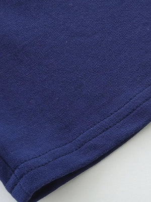 Boys' navy blue cotton underwear with double-stitched hem detail.