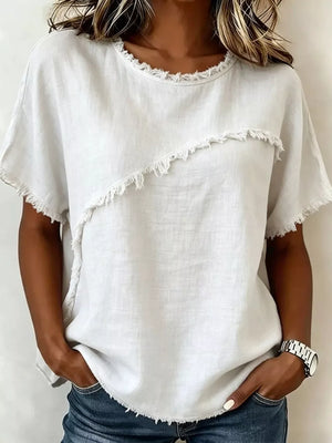 White frayed hem relaxed-fit short sleeve shirt with asymmetrical detail.