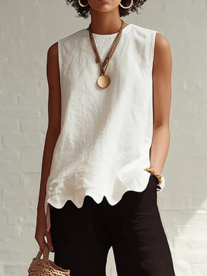 White sleeveless tank top with scalloped hem detail