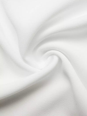 White cap sleeve midi dress fabric detail