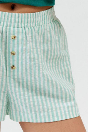 Seersucker boxer shorts in light green and white stripe with button detail and elastic waist.