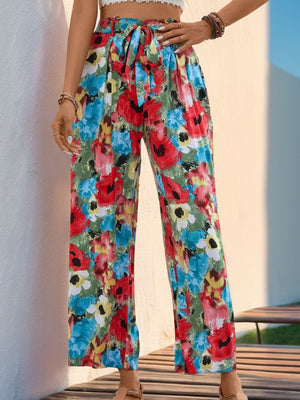 Painterly floral wide-leg trousers with a tie waist in multicolor.