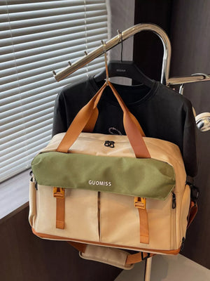 Chic nylon travel bag with olive flap, tan body, and brown straps.