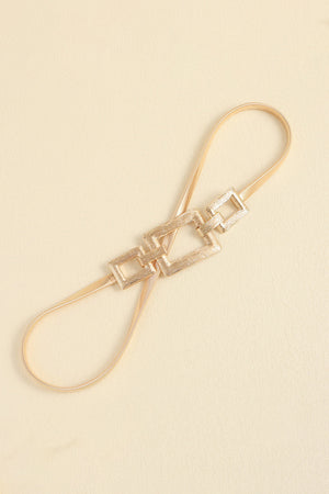 Gold elastic belt with textured geometric rectangle buckle detail
