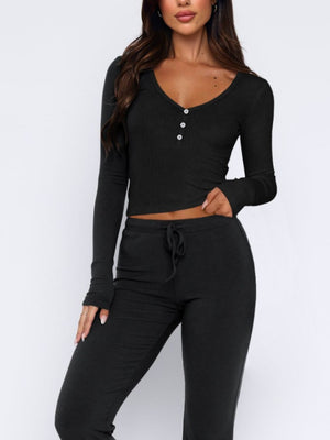 Black ribbed loungewear set with long sleeve henley top and drawstring pants