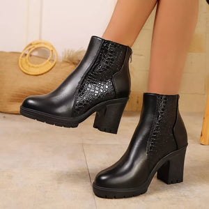 Black crocodile-embossed pointed toe block heel boots with chunky heel