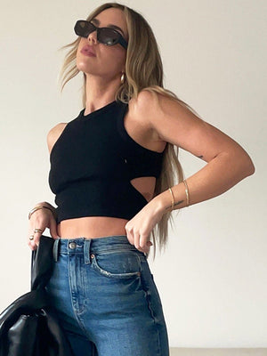 Black ribbed crop top with cutout sides and a sleeveless design.