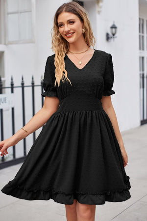 Black textured dot puff sleeve fit-and-flare dress with ruffled hem