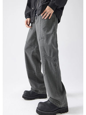Gray cotton wide-leg trousers with panel stitching detail.