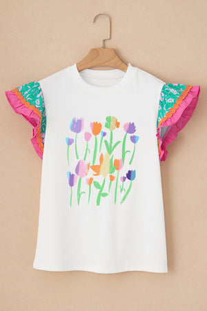 White t-shirt with colorful floral print and ruffled sleeves.