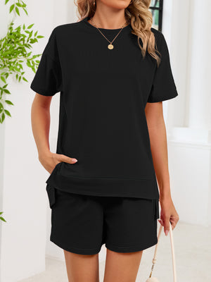 Black relaxed two-piece set with crew neck tee and pocketed shorts