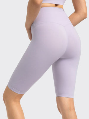 Sculpted Active Bike Shorts in Heliotrope Purple with V-shaped back seam detail.