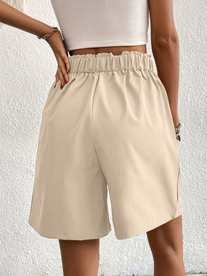 Beige pleated front bermuda shorts with elastic waistband and side pockets