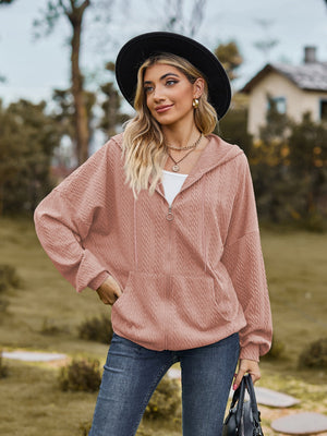 Pale Blush textured knit dolman sleeve zip-up hoodie with pockets.