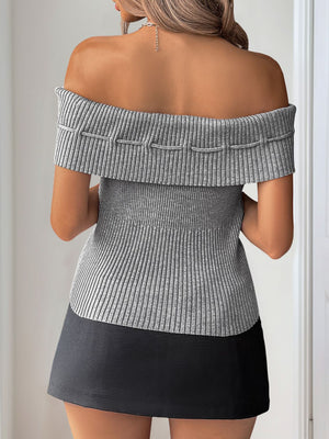 Gray off-shoulder ribbed knit blouse with decorative stitching detail and bow accent.