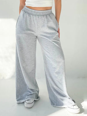 Light gray wide-leg lounge pants with elastic waistband and pockets