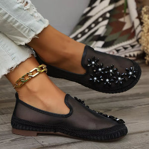 Round Toe Slip-ons in Black, model styling view