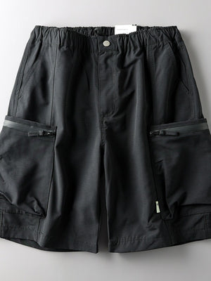 Black relaxed fit cargo shorts with zippered pockets and elastic waistband.