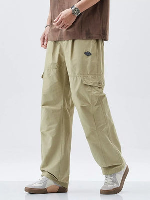 Khaki cargo pants with adjustable waist and multiple pockets.