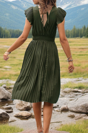 Dark Green pleated midi dress with flutter sleeves and smocked waist, featuring a V-neck and tie back.