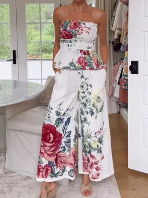 Chic floral ruched strapless top and wide-leg pants set in white polyester.