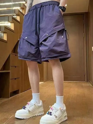 Mauve cargo shorts with drawstring waist and multiple flap pockets.